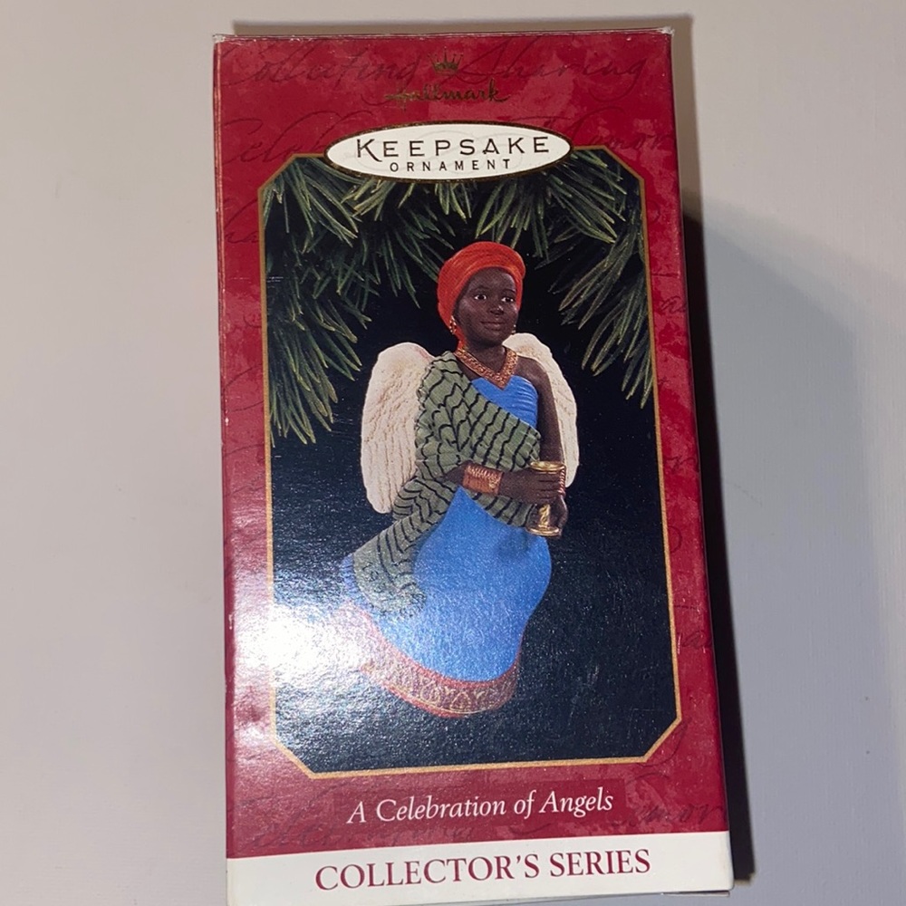 Vintage 1997 Hallmark Keepsake ornament from the A Celebration of Angels series.